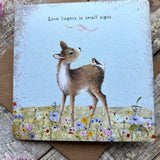 Love Lingers In Small Signs Greetings Card