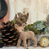 Three Adorable Flocked Reindeer